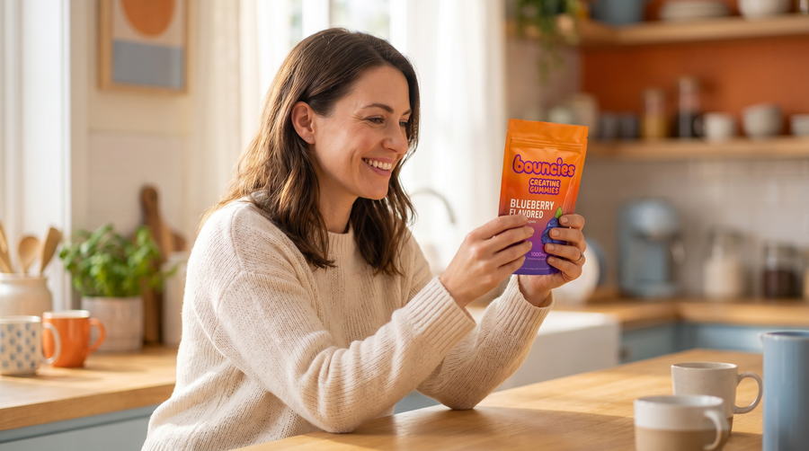 Woman holding Bouncies creatine gummies